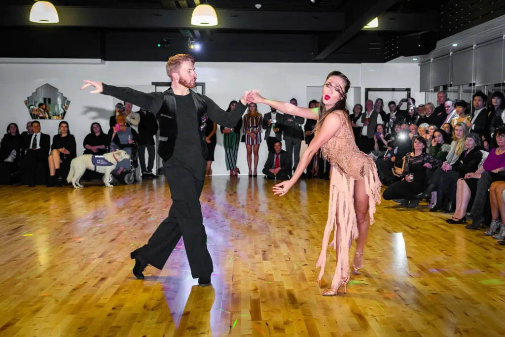 man and woman dancing at romeo dance academy